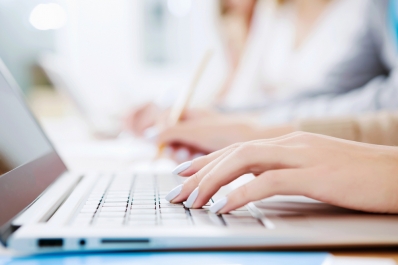 Teen Summer Reading Registration Closeup fingers typing on a keyboard