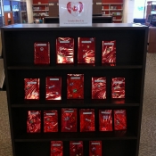 Canadian blind date book display on wooden shelf