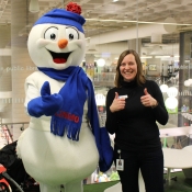 Chimo the snowman and HPL staff member give three thumbs up